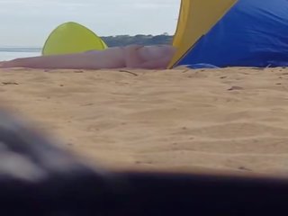 Flirty milf spied at beach (please comment)