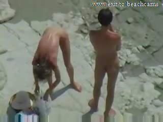 Spying randy Couple at Nude Beach